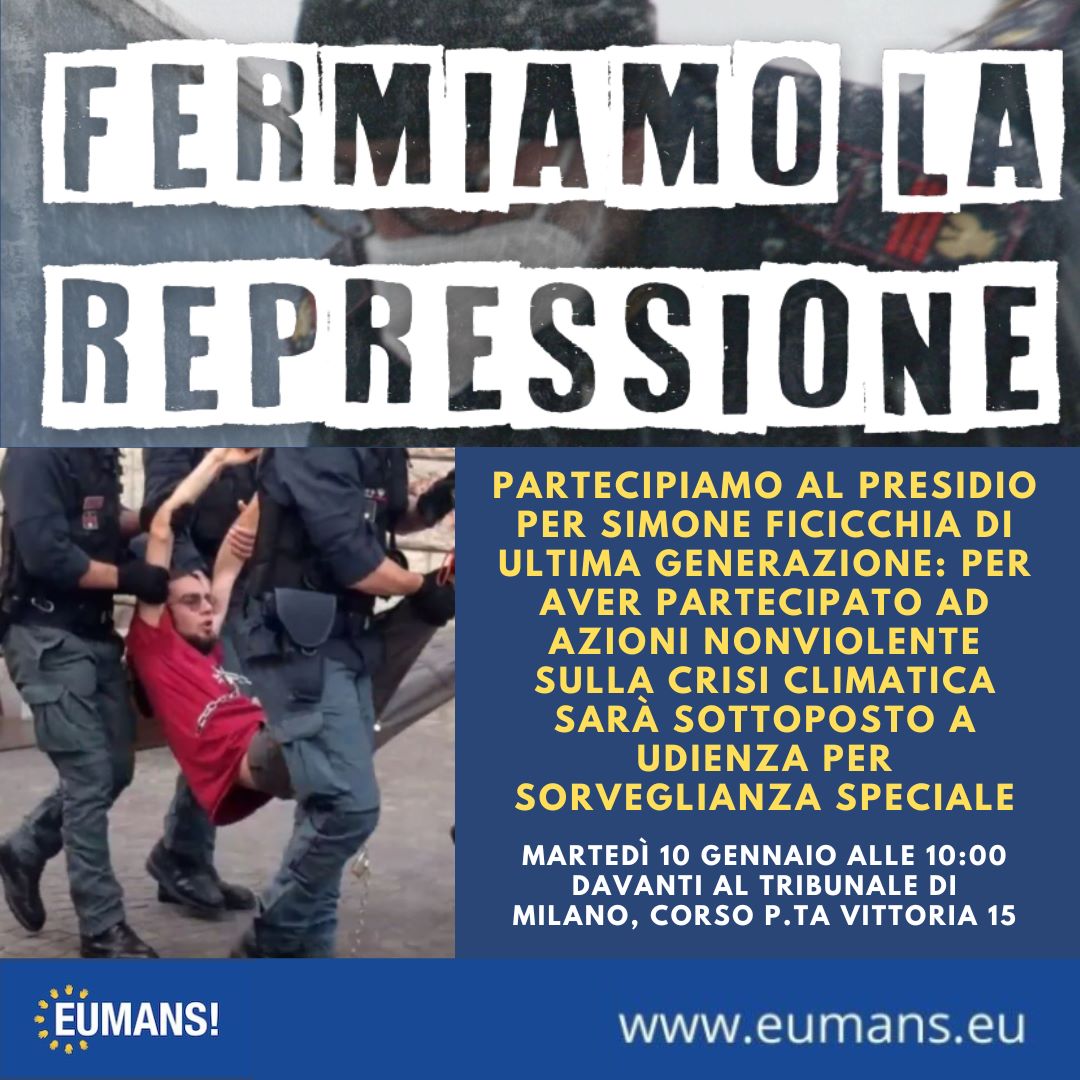 Simone Ficicchia trascinato via dalle forze dell'ordine durante un'azione nonviolenta